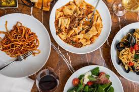 at1